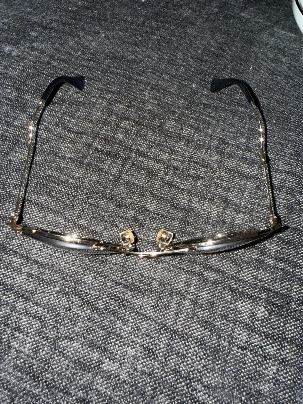 Miu Miu Gold Frame Sunglasses with Black Lenses